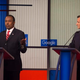 Ben Carson speaks as Texas Sen. Ted Cruz looks on during the Republican presidential debate at the Iowa Events Center in Des Moines on Jan. 28, 2016.
Jim Watson/Getty Images